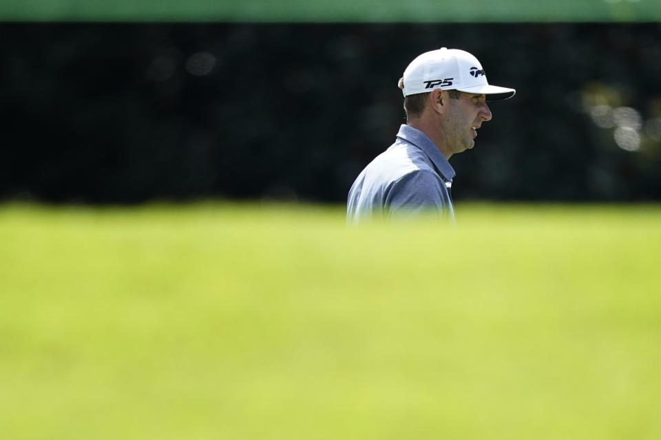 Dustin Johnson walks towards the fifth green during practice at the Tour Championship golf tournament on Wednesday, Sept. 1, 2021, at East Lake Golf Club in Atlanta. (AP Photo/Brynn Anderson)