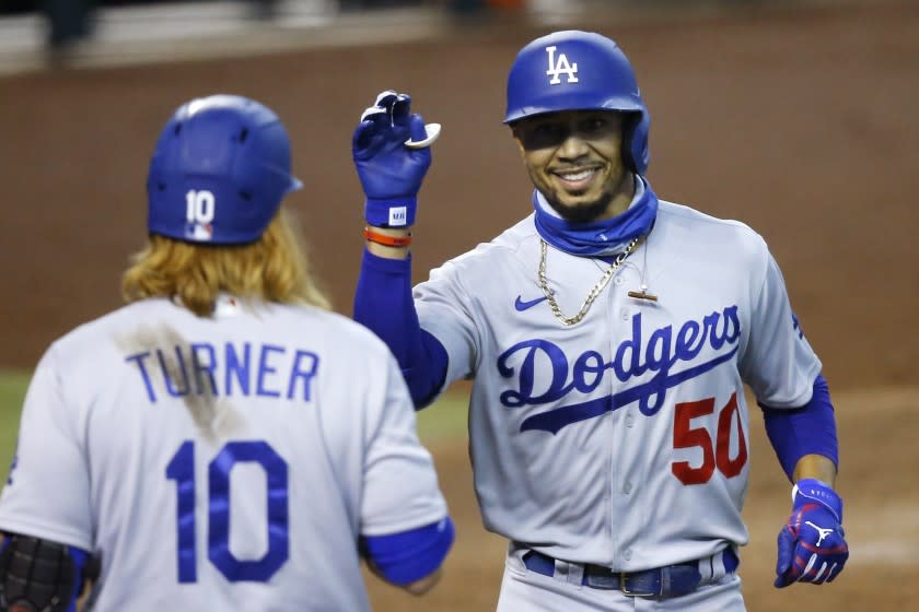 Los Angeles Dodgers' Mookie Betts (50) celebrates his home run.