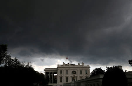 Storm clouds gather over the White House in Washington, D.C., U.S. August 13, 2018. REUTERS/Leah Millis