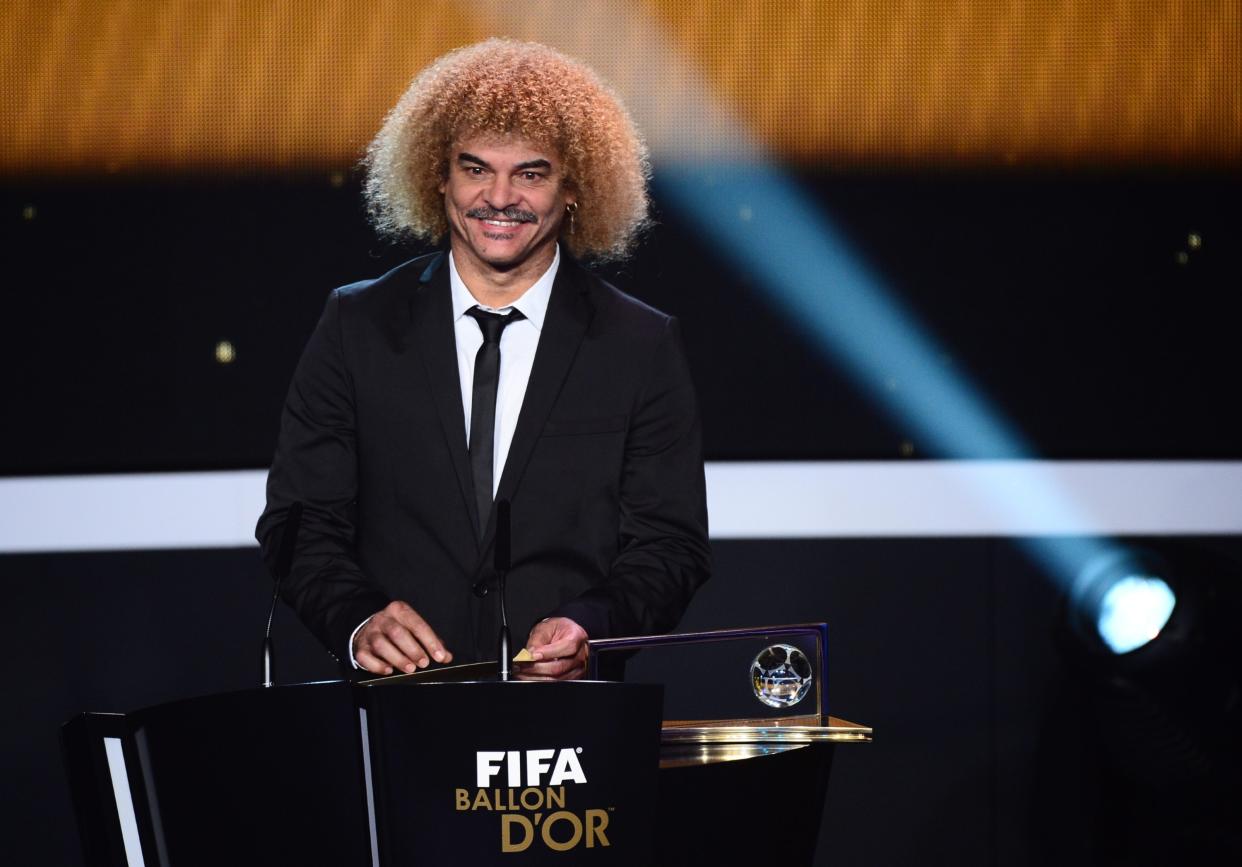Former Colombian footballer Carlos Valderrama arrives on stage to present the FIFA Puskas award during the FIFA Ballon d'Or awards ceremony at the Kongresshaus in Zurich on January 7, 2013. AFP PHOTO / OLIVIER MORINOLIVIER MORIN/AFP/Getty Images