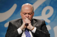 <p>New Ford Motor Company CEO Jim Hackett listens to a question after being introduced as the automaker’s chief executive, in Dearborn, Mich., May 22, 2017. Ford is replacing CEO Mark Fields as it struggles to keep its traditional auto-manufacturing business running smoothly while remaking itself as a nimble, high-tech provider of new mobility services. (Photo: Paul Sancya/AP) </p>