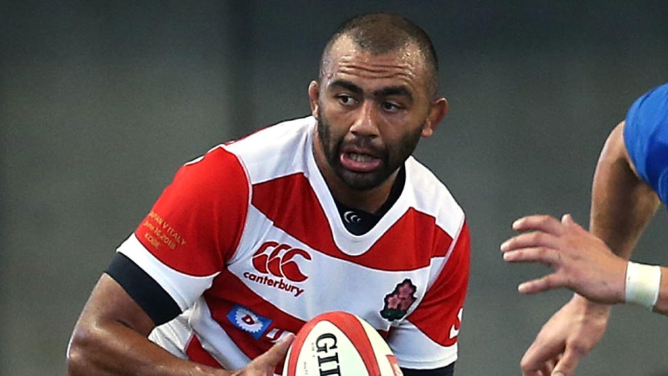 Japanese rugby captain Michael Leitch helped pull the car off his pinned teammate. Pic: Getty