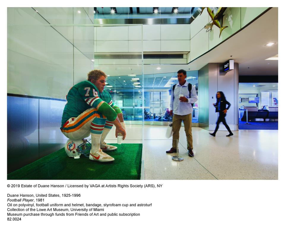 Duane Hanson’s iconic, hyperrealist sculpture, “Football Player” at Miami International Airport.