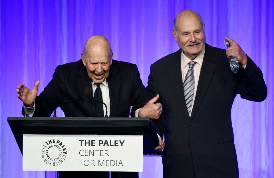 Writer and director Carl Reiner, left, regales the audience at a Paley Honors tribute to comedy legends Thursday. His son, acclaimed director Rob Reiner, introduced his father at the ceremony.