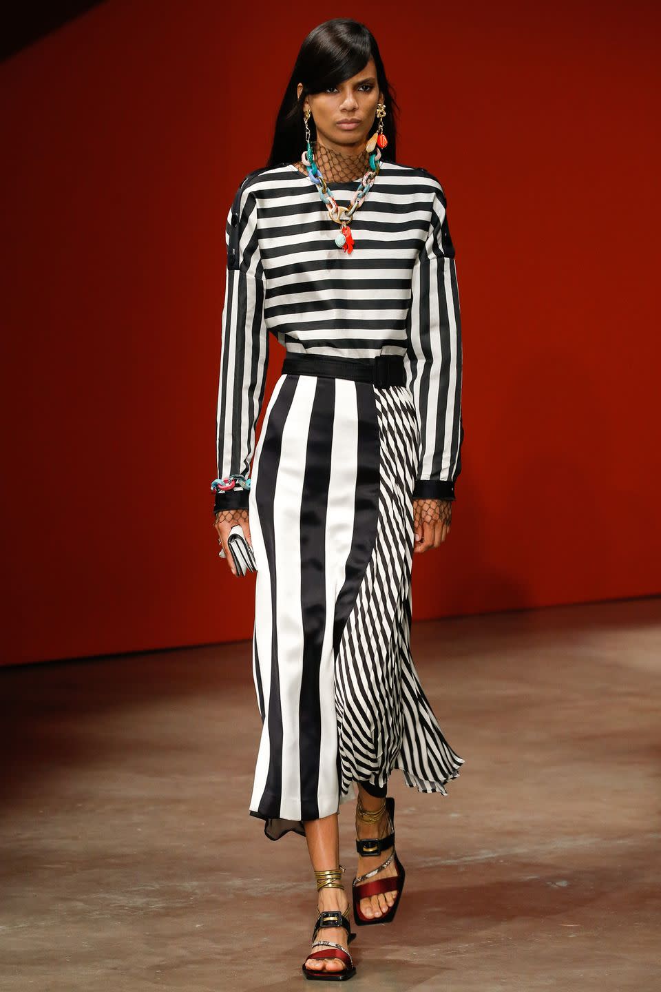 <p>It's a common misconception that large busted women should avoid horizontal stripes. However, this theory has been debunked several times over the decades, with stripes being found to draw in rather than widen a woman's silhouette. If in doubt, go for a design similar to this Ports 1961 midi dress that has diagonal, vertical and horizontal stripes and a thick waistband. </p><p>EG J.Crew, Lisbeth striped crepe maxi dress - £210</p><p><a class="link " href="https://go.redirectingat.com?id=127X1599956&url=https%3A%2F%2Fwww.net-a-porter.com%2Fgb%2Fen%2Fproduct%2F1173582%2FJCrew%2Flisbeth-striped-crepe-maxi-dress&sref=http%3A%2F%2Fwww.elle.com%2Fuk%2Ffashion%2Fwhat-to-wear%2Fg29055066%2Fbig-breasts-runway-looks%2F" rel="nofollow noopener" target="_blank" data-ylk="slk:SHOP NOW;elm:context_link;itc:0;sec:content-canvas">SHOP NOW</a></p>