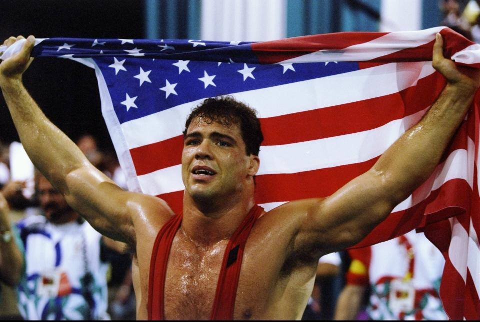 <p>Before he became an actor, pro wrestler and WWE star, Kurt Angle was a heavyweight wrestling gold medalist at the 1996 Summer Olympics in Atlanta. (Getty) </p>