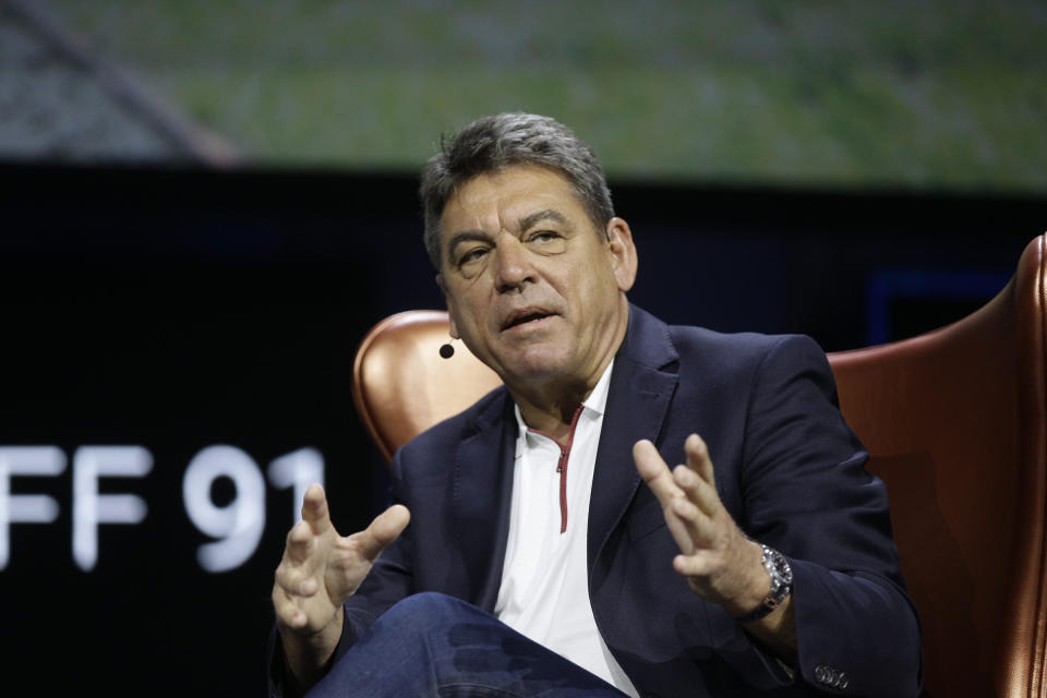 Dr. Carsten Breitfeld, Global CEO of Faraday Future, talks during the technology panel "Faraday's Future: Transforming The Road of Future Mobility," at the AutoMobility LA auto show at the Los Angeles Convention Center in Los Angeles Tuesday, Nov. 19, 2019. (AP Photo/Damian Dovarganes)