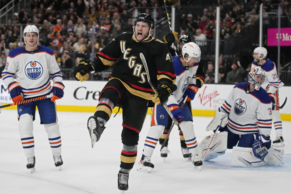 Vegas Golden Knights center Paul Cotter (43) celebrates after scoring against the Edmonton Oilers during the second period of an NHL hockey game Saturday, Jan. 14, 2023, in Las Vegas. (AP Photo/John Locher)