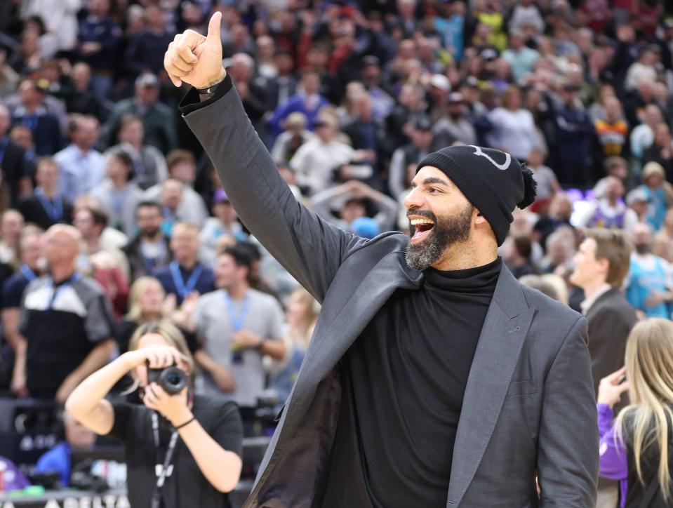 Former Jazz player Carlos Boozer waves to the crowd in Salt Lake City on Thursday, Feb. 22, 2024. | Jeffrey D. Allred, Deseret News