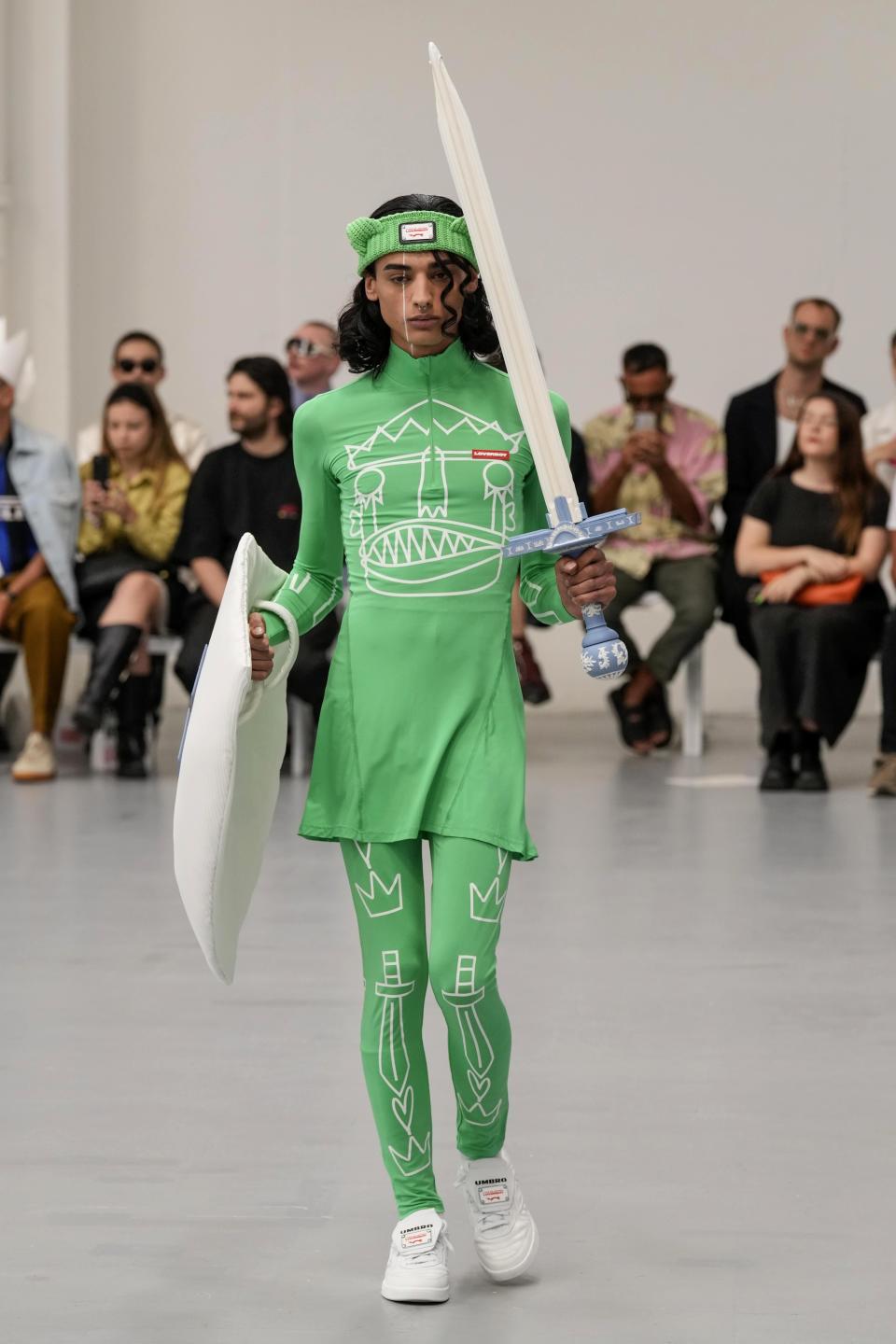 A model wears a creation as part of the Jeffrey Loverboy men's Spring Summer 2024 collection presented in Milan, Italy, Sunday, June 18, 2023. (AP Photo/Antonio Calanni)