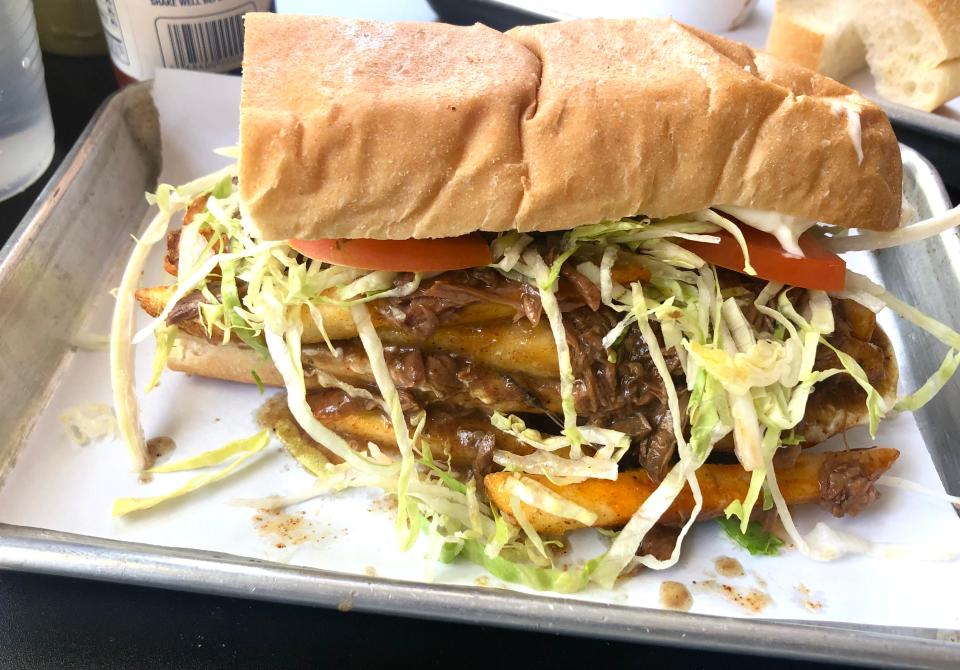 Benny and Clovis Po’Boy is served at Spicy Boys.