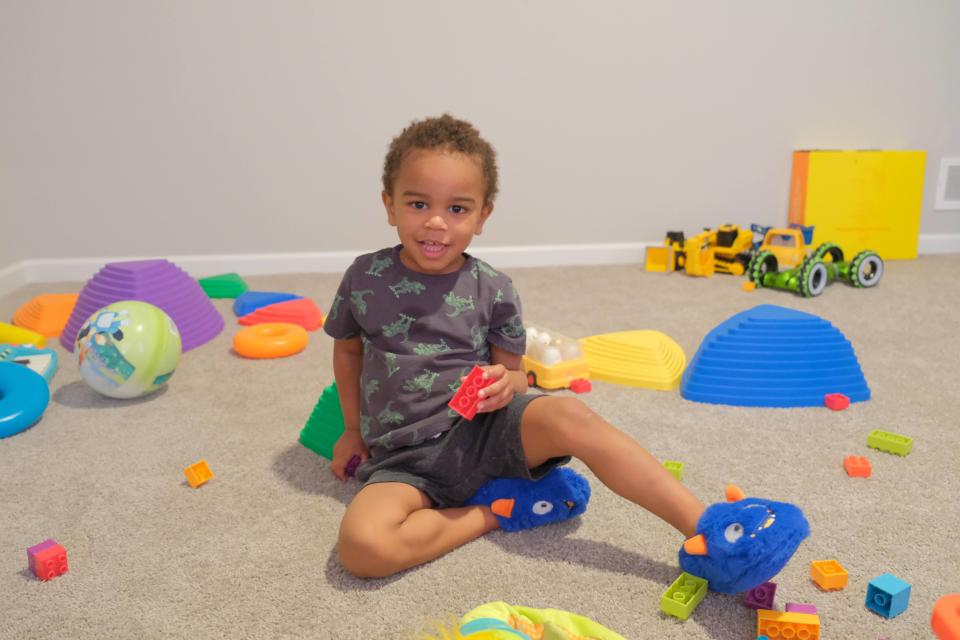 Zaire “Rico” McCurdy, 3, plays in his Pataskala home. He loves moving and climbing so his playroom has lots of open space for him to jump and explore.