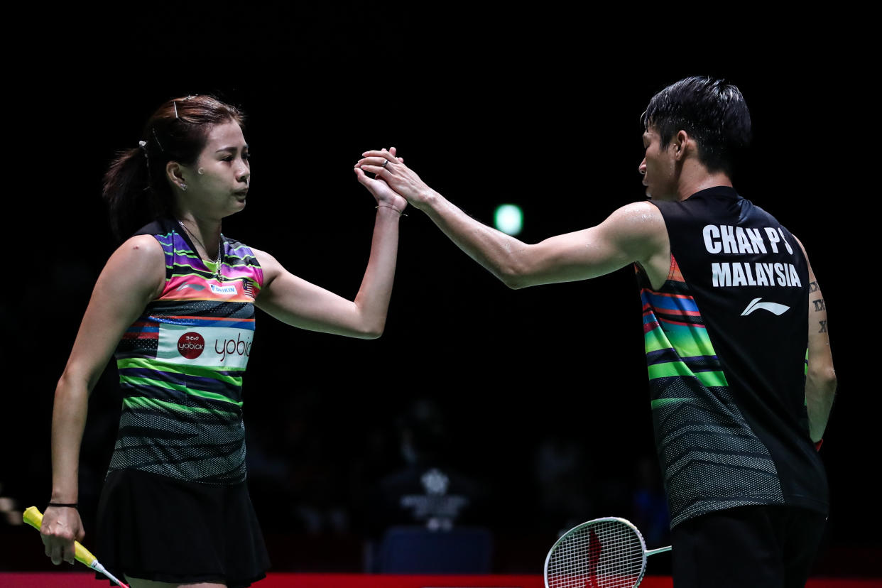 CHOFU, JAPAN - JULY 26: Chan Peng Soon(R) and Goh Liu Ying of Malaysia react in the Mixed Doubles quarter finals match against Yuta Watanabe and Arisa Higashino of Japan during day four of the Daihatsu Yonex Japan Open Badminton Championships, Tokyo 2020 Olympic Games test event at Musashino Forest Sport Plaza on July 26, 2019 in Chofu, Tokyo, Japan. (Photo by Shi Tang/Getty Images)