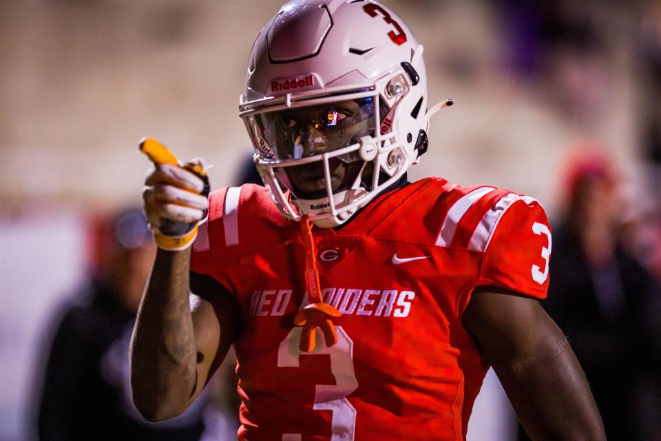 Greenville’s Mazeo "MJ" Bennett (3) points at the camera after a touchdown. Greenville played Northwestern at Greenville in high school football on Friday, Nov. 25, 2022 at Greenville High school