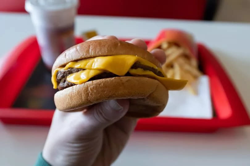 Man holding burger