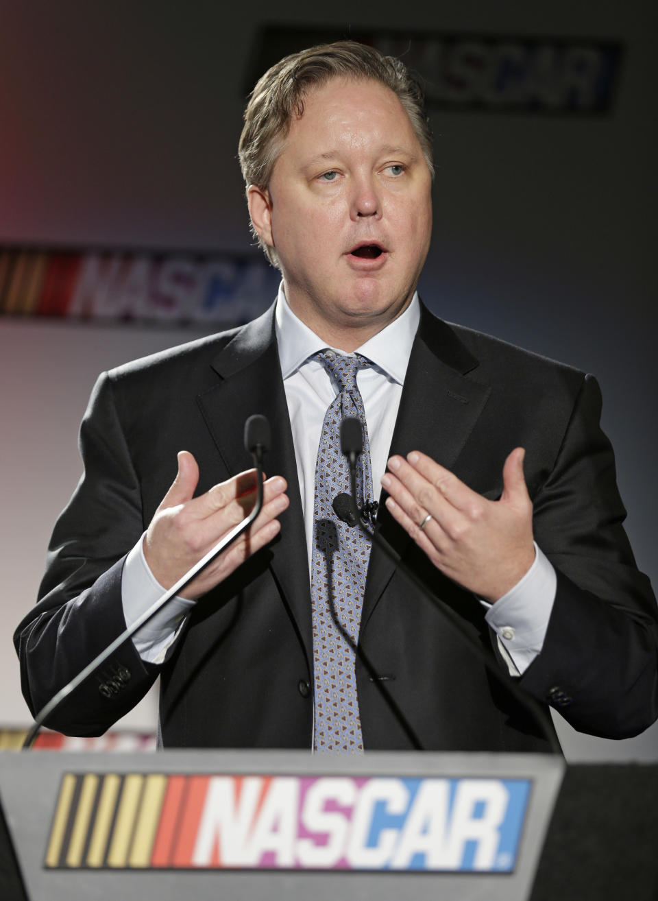 NASCAR CEO Brian France speaks to the media during a news conference at the NASCAR Sprint Cup auto racing Media Tour in Charlotte, N.C., Thursday, Jan. 30, 2014. (AP Photo)