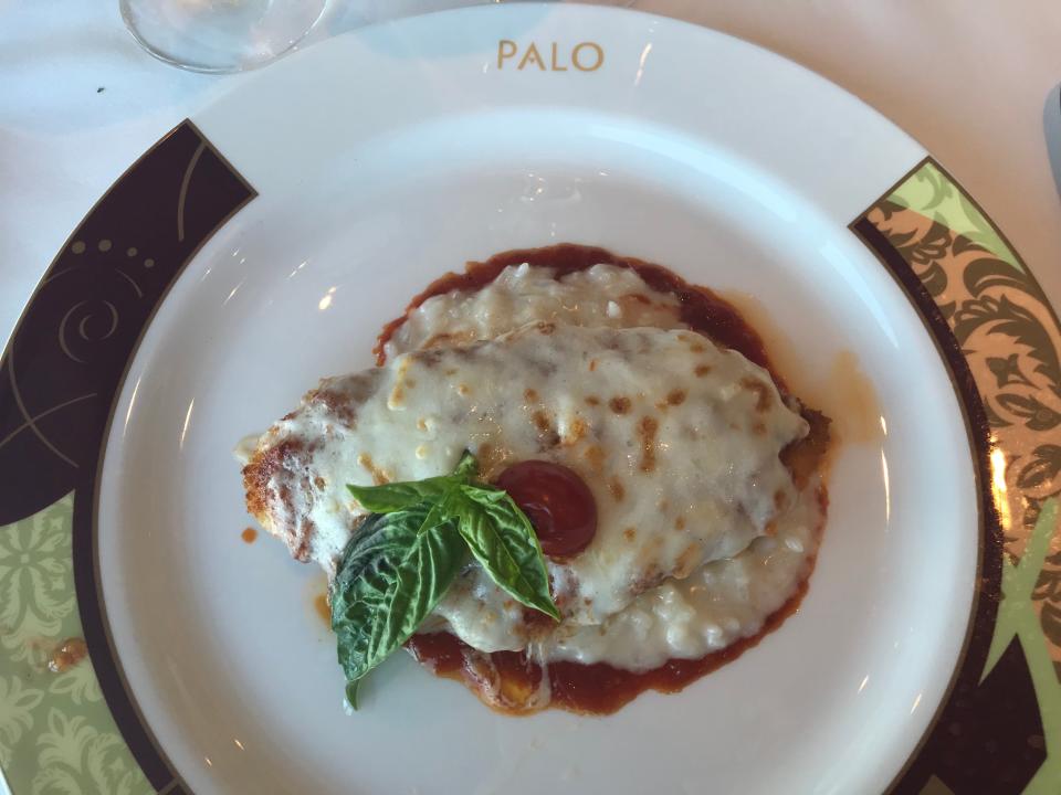 artful plate of chicken parmesan from palo restaurant on disney cruise