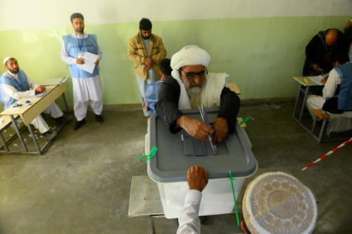 Voters waited hours to cast their votes across Afghanistan, even with violence and lengthy delays