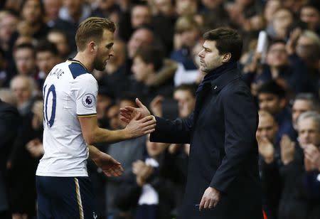 Britain Soccer Football - Tottenham Hotspur v Stoke City - Premier League - White Hart Lane - 26/2/17 Tottenham manager Mauricio Pochettino embraces Harry Kane as he is substituted off Action Images via Reuters / Peter Cziborra