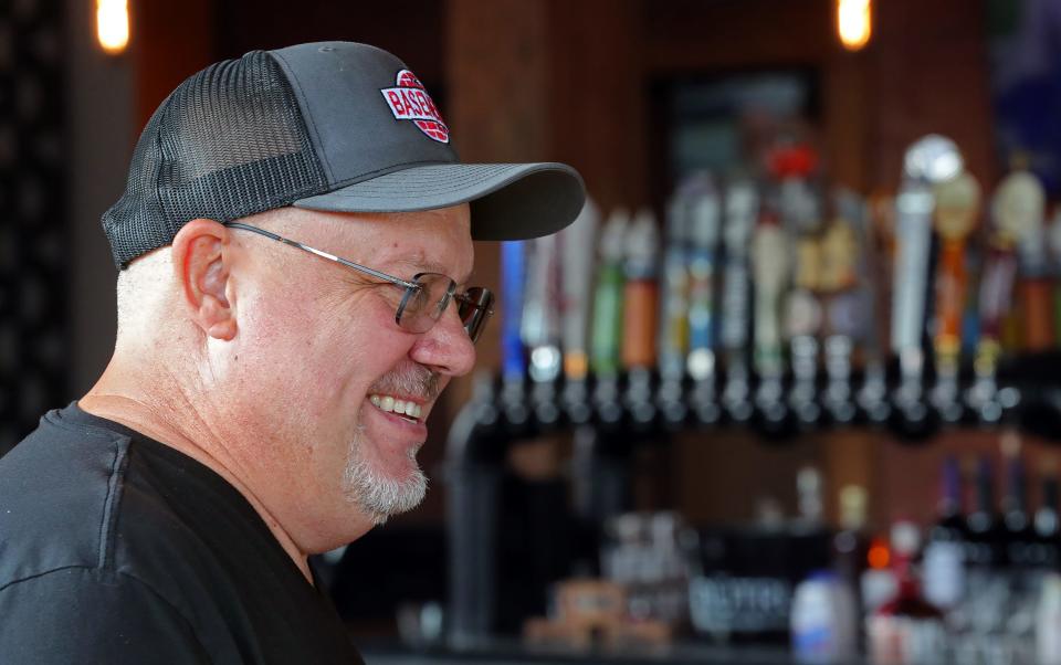 Tim Adkins, co-owner of Town Tavern, grins as he discusses his new Copley restaurant Wednesday, Sept. 20, 2023, in Copley, Ohio.