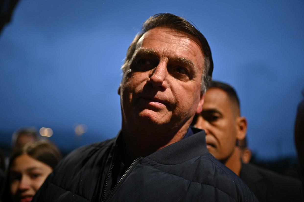 <span>Former president of Brazil Jair Bolsonaro attends a political conference at the weekend. He has been accused by police of links to a gang selling luxury gifts presented to his office by foreign leaders.</span><span>Photograph: André Borges/EPA</span>