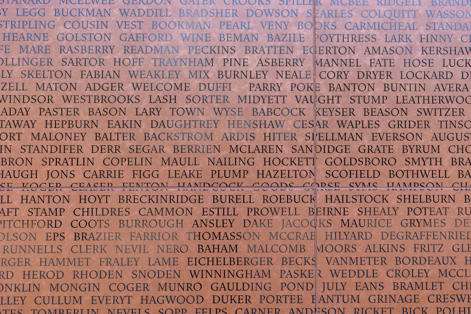 Detail from the National Monument to Freedom, during a media tour of Equal Justice Initiative's new Freedom Monument Sculpture Park, Tuesday, March 12, 2024, in Montgomery, Ala. The monument, measuring a 43 feet tall, 155 feet long, memorializes over 120,000 unique surnames of formerly enslaved people, documented at the time of emancipation at the end of the Civil War. (AP Photo/Vasha Hunt)