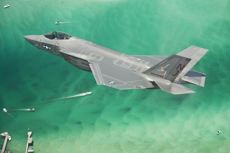 A U.S. Navy F-35C from VFA-101 flying over the Florida shore. (USN)