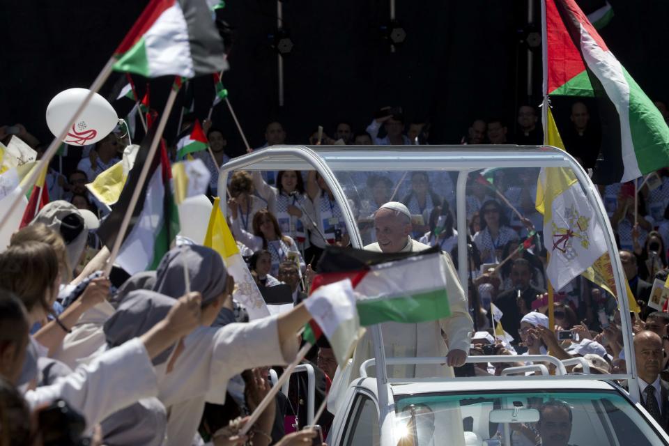 Pope Francis arrives to celebrate mass in Manger Square next to the Church of the Nativity, believed by many to be the birthplace of Jesus Christ, in the West Bank city of Bethlehem