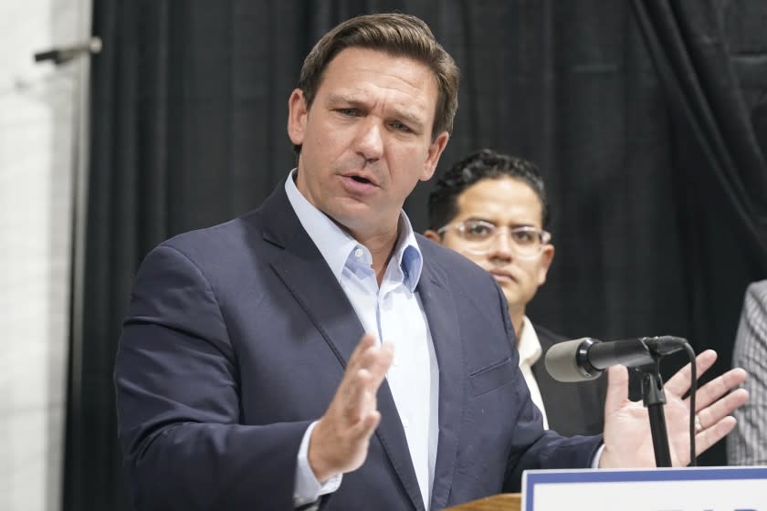 Florida Governor Ron DeSantis speaks at the opening of a monoclonal antibody site Wednesday, Aug. 18, 2021, in Pembroke Pines, Fla. The site at C. B. Smith Park will offer monoclonal antibody treatment sold by Regeneron to people who have tested positive for COVID-19. (AP Photo/Marta Lavandier)