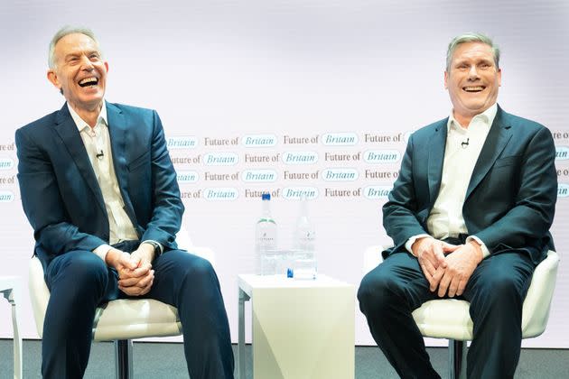 Former Prime Minister Tony Blair (left) and Labour leader Sir Keir Starmer discuss politics at the Tony Blair Institute