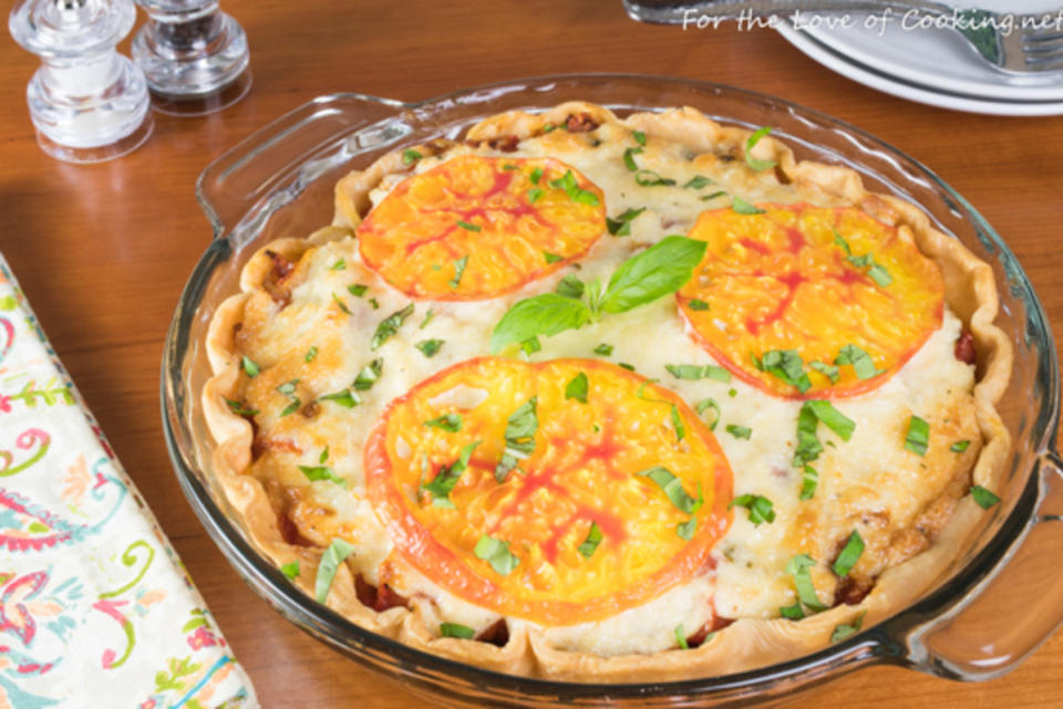 <p>For the Love of Cooking</p><p>Add this bake to your summer tomato bucket list. </p><p><strong>Get the recipe: </strong><a href="https://www.fortheloveofcooking.net/2018/08/southern-tomato-pie.html" rel="nofollow noopener" target="_blank" data-ylk="slk:Southern Tomato Pie;elm:context_link;itc:0;sec:content-canvas" class="link "><strong>Southern Tomato Pie</strong></a></p>