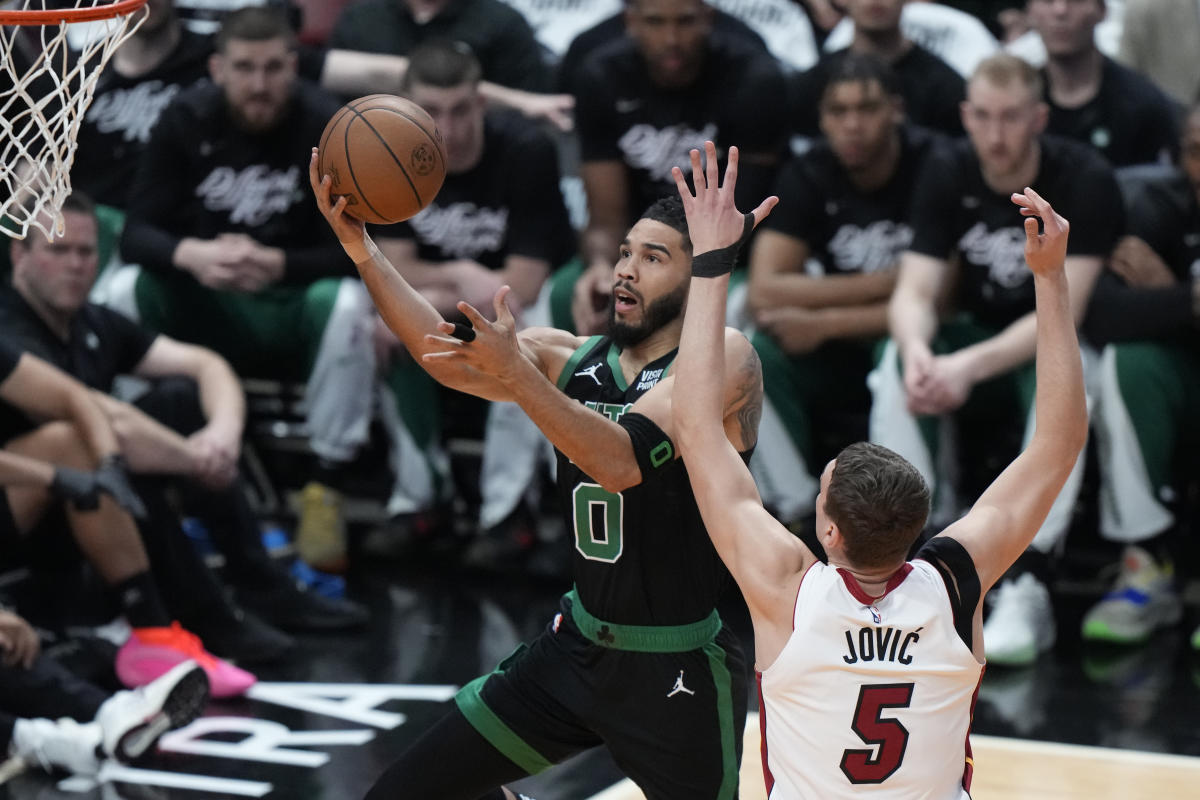 Boston Celtics Dominate Miami Heat in NBA Playoffs: 2-1 Lead After Impressive Defense and Offense Display