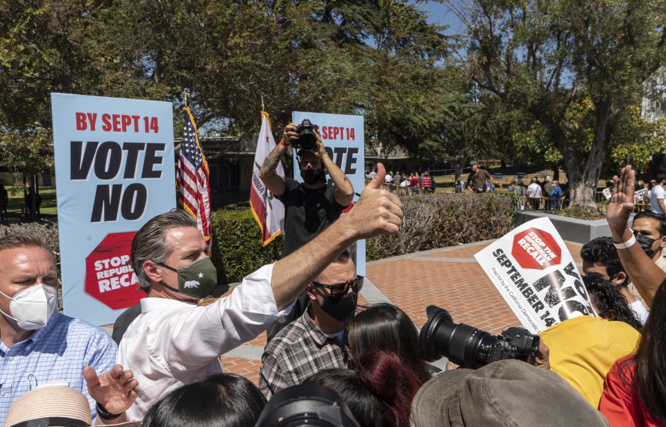 California Gov. Gavin Newsom gives a thumbs-up as he greets supporters at an event against the recall election at the Culver City High School in Culver City, Calif., Saturday, Sept. 4, 2021.