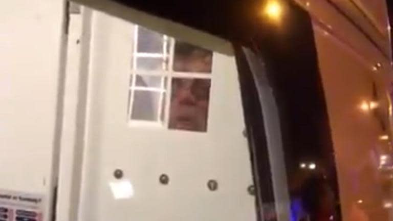 Finsbury Park Mosque attack: suspect under arrest appears to blow kiss to crowd from inside police van