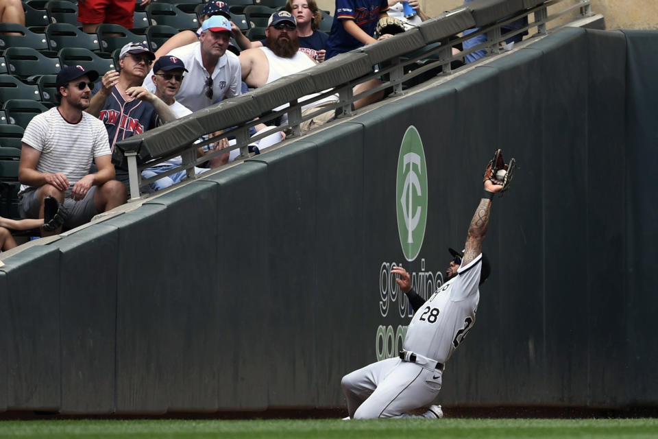 Chicago White Sox left fielder Leury Garcia catches a fly ball by Minnesota Twins designated hitter Luis Arraez during the fourth inning of a baseball game, Sunday, July 17, 2022, in Minneapolis. (AP Photo/Craig Lassig)