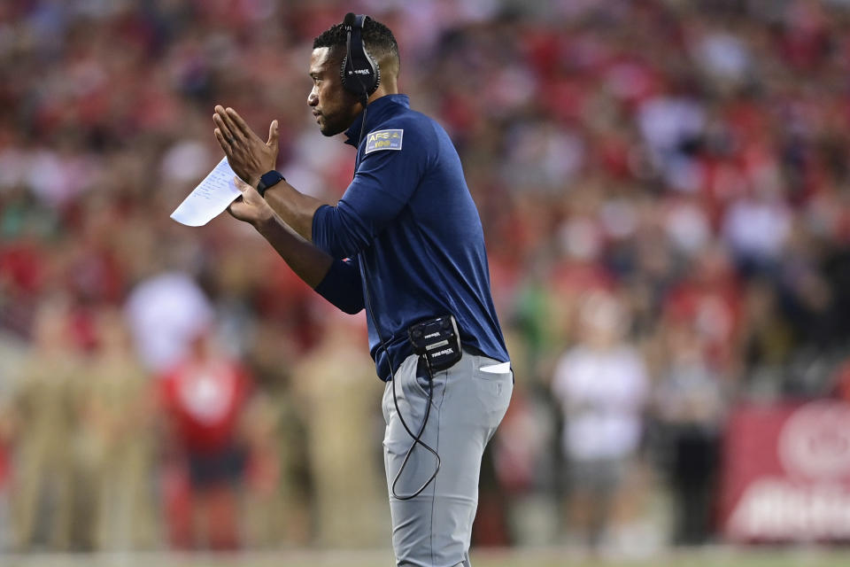 Notre Dame head coach Marcus Freeman claps during the first quarter of an NCAA college football game against Ohio State, Saturday, Sept. 3, 2022, in Columbus, Ohio. (AP Photo/David Dermer)