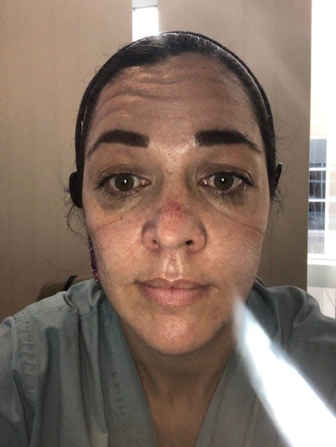 Erin McIntosh, 38, is a nurse in Riverside County southeast of Los Angeles, where COVID-19 rates have been skyrocketing. McIntosh took this selfie on Mother’s Day at the beginning of the pandemic, "after a 12 hour shift with no break," she said. "I lost a patient after spending much of my day trying to keep them alive. A lot of time has passed since then and it’s gotten so much worse."