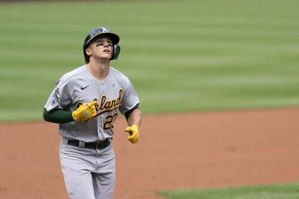 Oakland Athletics' Zack Gelof celebrates after hitting a home run during the first inning of a baseball game against the Washington Nationals, Sunday, Aug. 13, 2023, in Washington. (AP Photo/Stephanie Scarbrough)