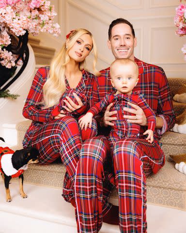 <p>Szymon Dybowski</p> Paris Hilton and Carter Reum with son Phoenix and daughter London in 2023 Christmas photos