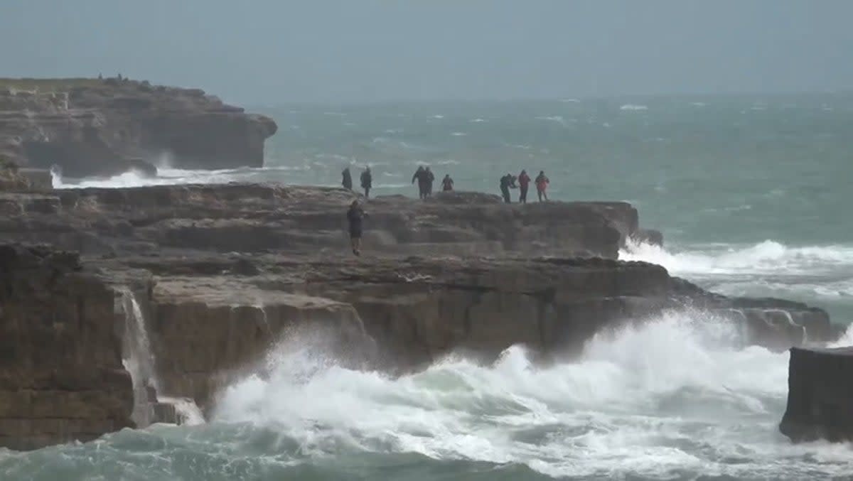 Waves crash against Dorset shore as danger to life warning issued (PA)