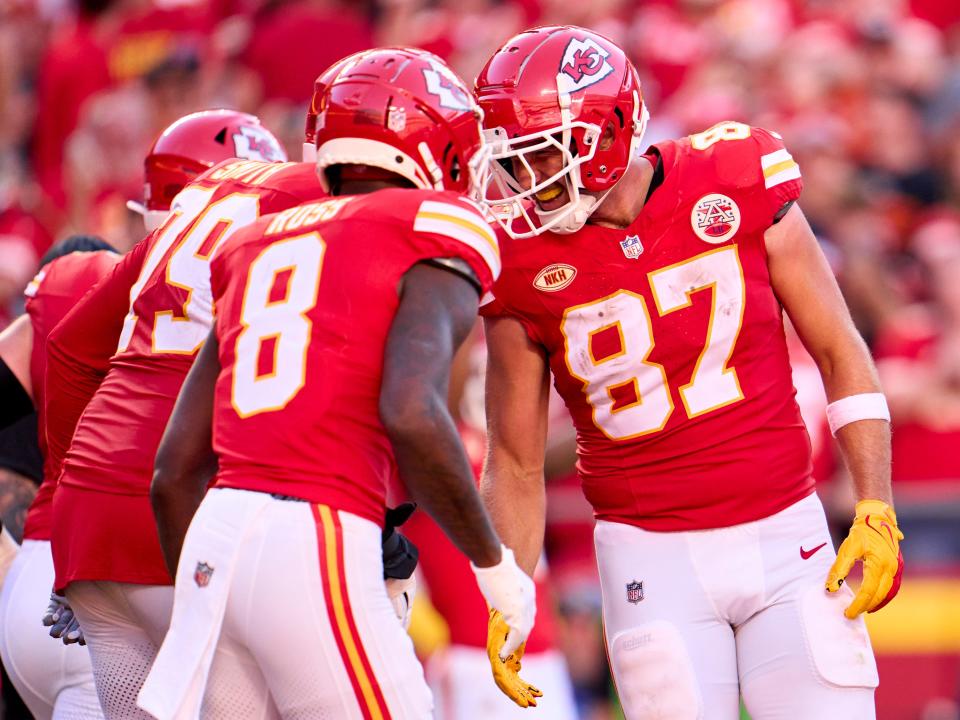 Travis Kelce #87 of the Kansas City Chiefs celebrates after scoring a touchdown against the Chicago Bears