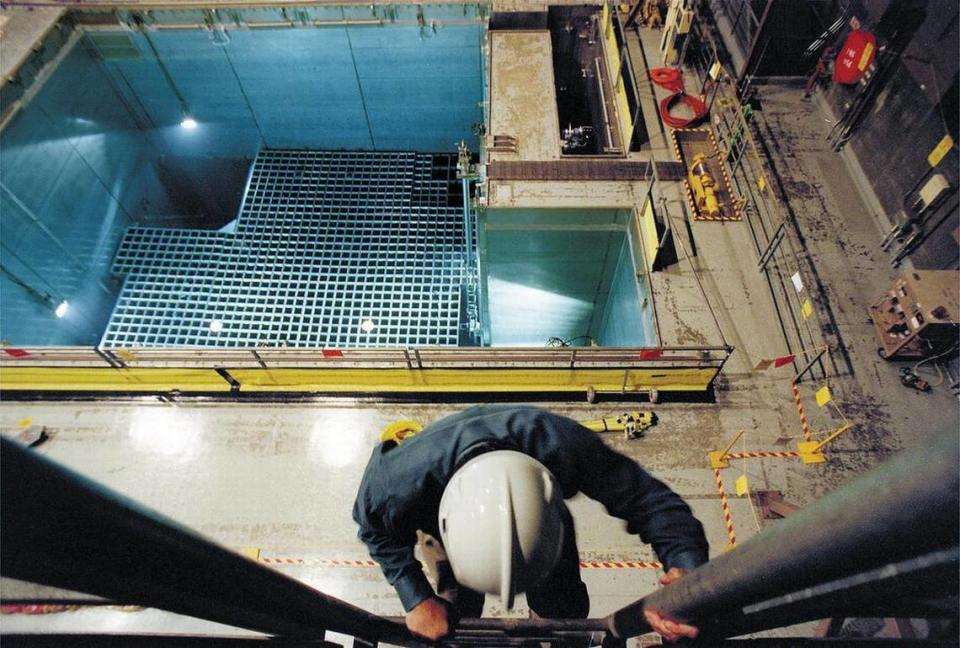 Jeff Lewis, former head of public relations at Diablo Canyon nuclear power plant, descends to the spent fuel storage area on Dec. 12, 1999. Uranium fuel rods are stored in the blue pool until the cool enough to move to dry casks.