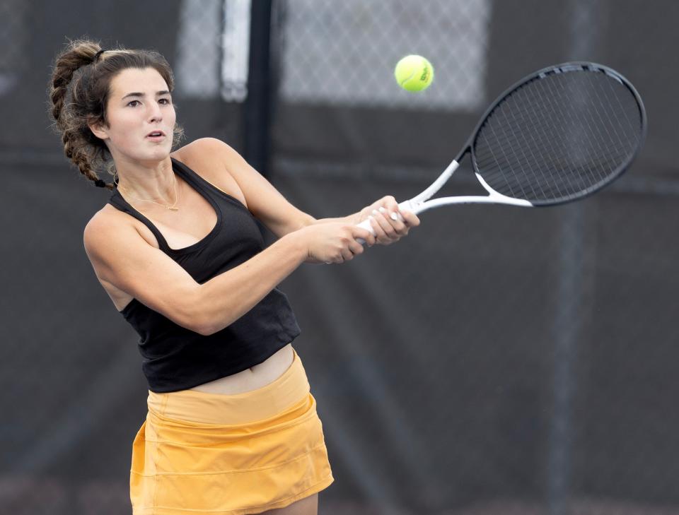 Hoover's Tess Bucher returns a shot to Wadsworth's Lauren Ball at the Division I sectional quarterfinals held at Jackson Thursday, October 5, 2023.