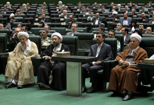 (L-R) Iran's head of Assembly of Experts Mohammad Reza Mahdavi Kani, judiciary chief Sadeq Larijani, President Mahmoud Ahmadinejad and former president Akbar Hashemi Rafsanjani attend the opening session of Iran's new parliament in Tehran on May 27. Ahmadinejad insisted Wednesday enriching uranium to 20 percent "is our right" and not a step towards a bomb