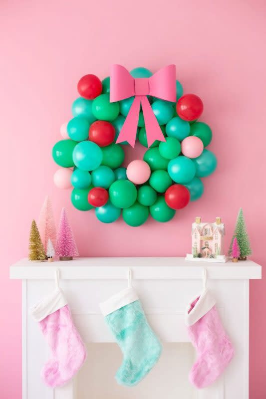 <p>Studio DIY</p><p>Kids will approve of this fun and playful decoration from <em><a href="https://studiodiy.com/diy-christmas-balloon-wreath//" rel="nofollow noopener" target="_blank" data-ylk="slk:Studio DIY;elm:context_link;itc:0;sec:content-canvas" class="link rapid-noclick-resp">Studio DIY</a></em>. They’ll especially enjoy helping you blow up balloons for it.</p>