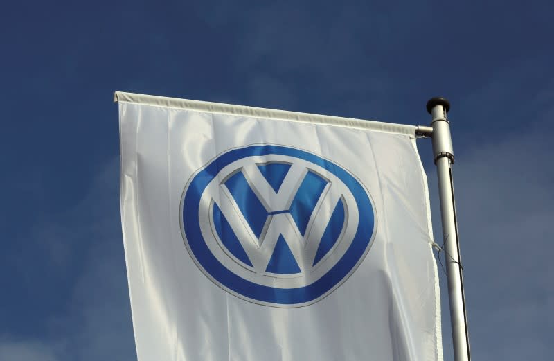 A flag of a Volkswagen VW car dealer is seen in Bochum, Germany March 16, 2016. REUTERS/Ina Fassbender