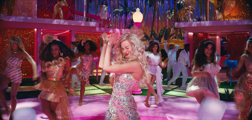 Barbie winks and claps while on the dance floor. (Courtesy Warner Bros. Pictures)