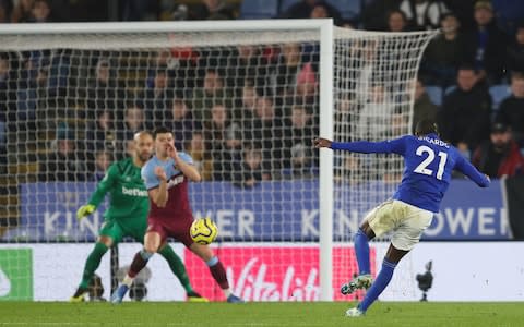 Ricardo Pereira of Leicester City scores a goal to make it 2-0 - Credit: James Williamson - AMA/Getty Images