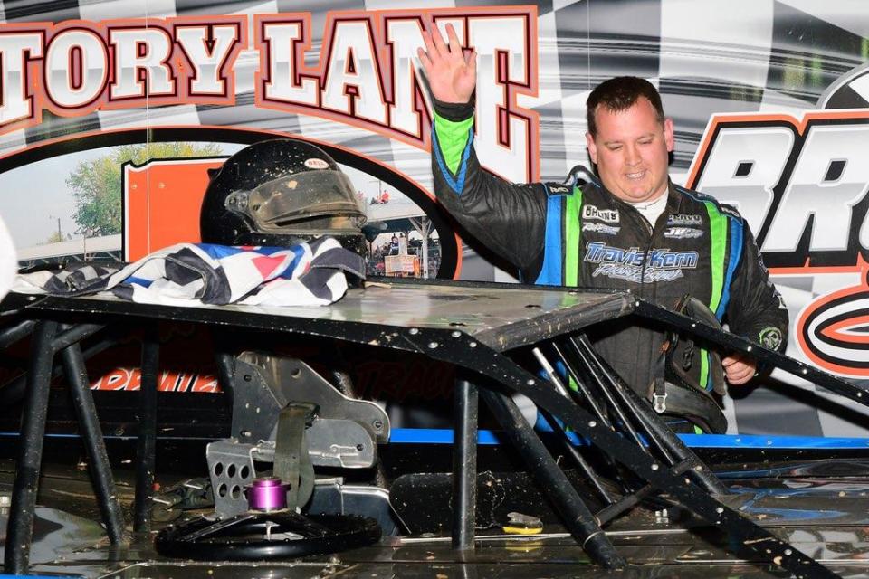 Bedford's Britan Godsey greets fans from victory lane on April 16 at Brownstown Speedway after claiming his first career win.