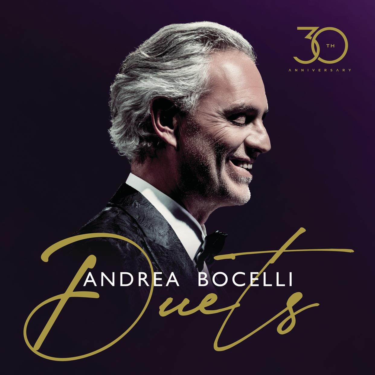 Album cover of Andrea Bocelli's Duets with Bocelli smiling in a suit